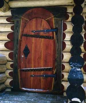 Вид деревянной двери для бани